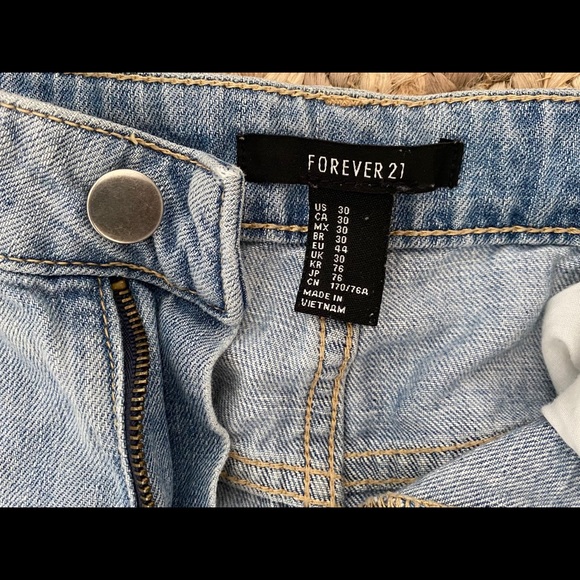 Distressed light denim jeans - Picture 2 of 3